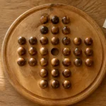 Jeux de billes sur plateau, solitaire bois avec croix anglaise et billes
